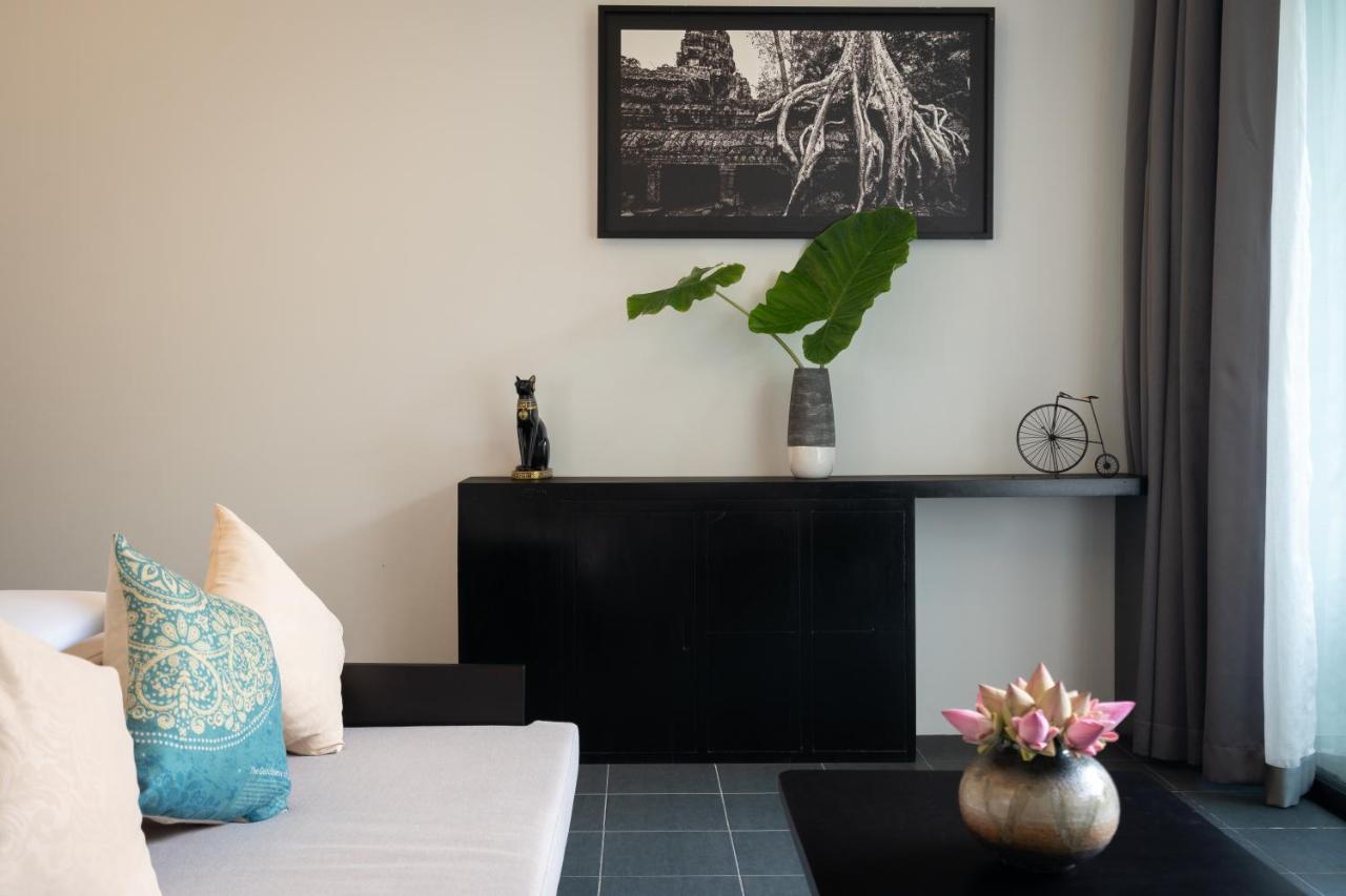 Eightfold Urban Resort Siem Reap Exterior foto A living room in a modern house