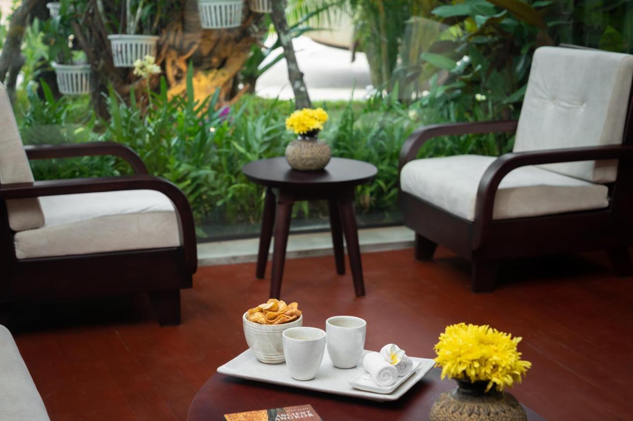 Eightfold Urban Resort Siem Reap Exterior foto A room at the hotel