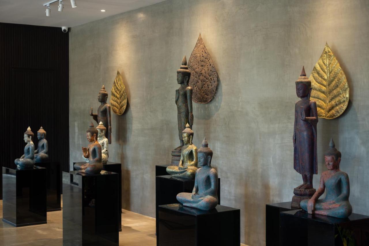 Eightfold Urban Resort Siem Reap Exterior foto A collection of Thai and Laotian art