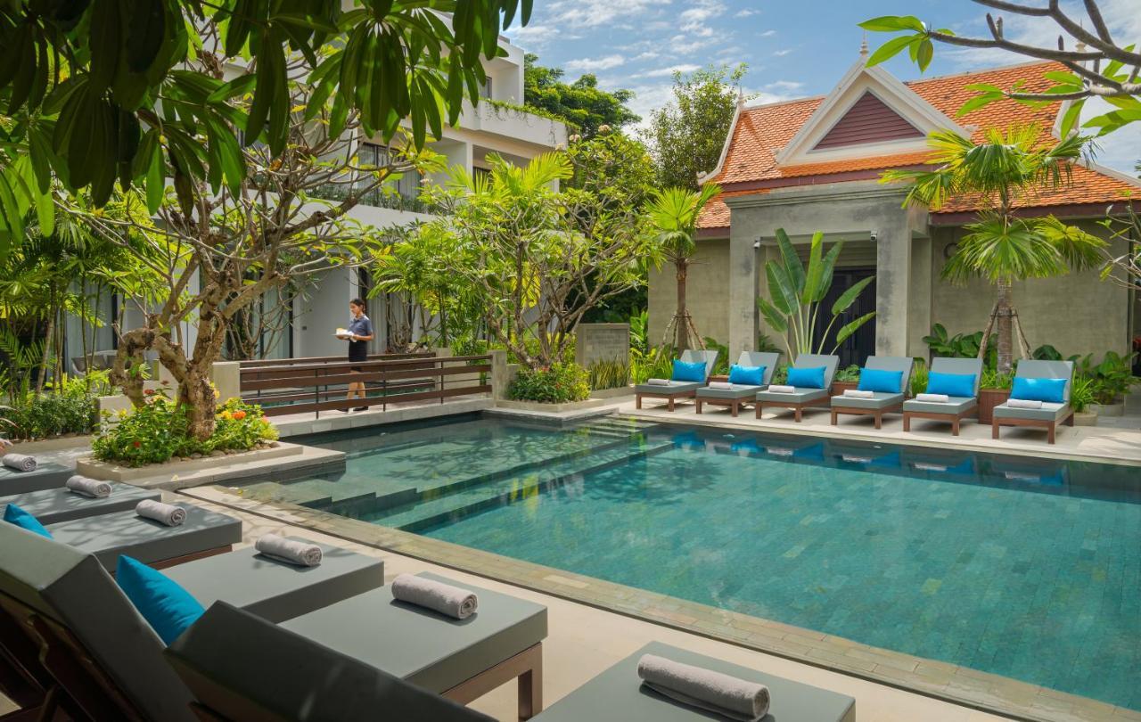Eightfold Urban Resort Siem Reap Exterior foto The swimming pool at The Library