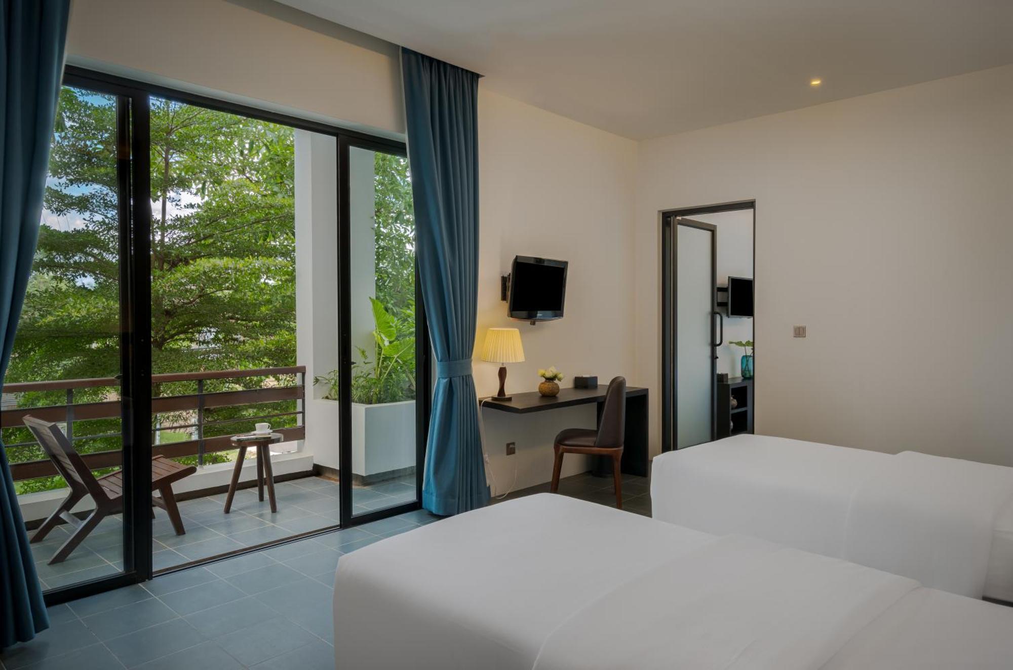 Eightfold Urban Resort Siem Reap Cameră foto Deluxe Room