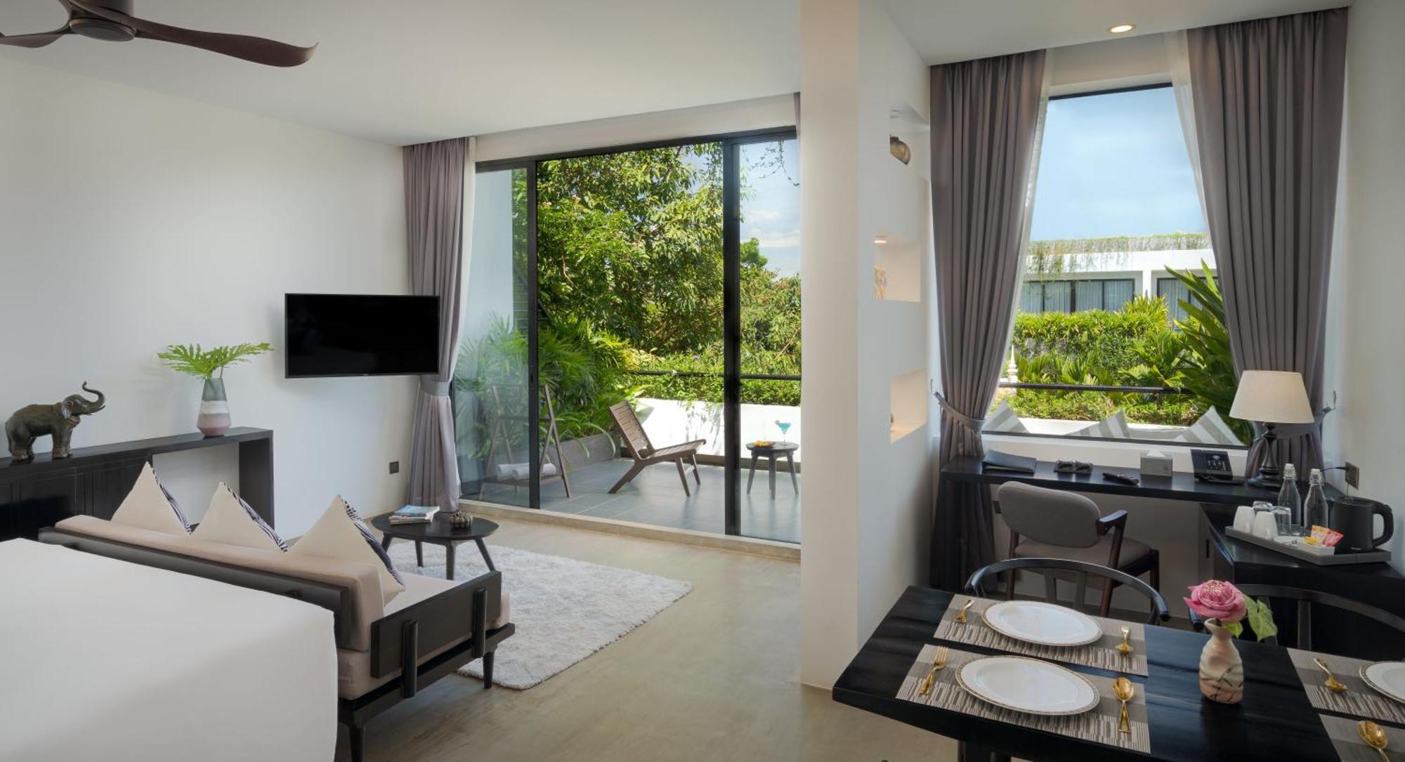 Eightfold Urban Resort Siem Reap Exterior foto A living room at the hotel